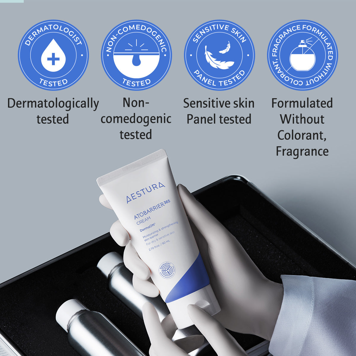Aestura skincare cream being held by a gloved hand with product features listed above.